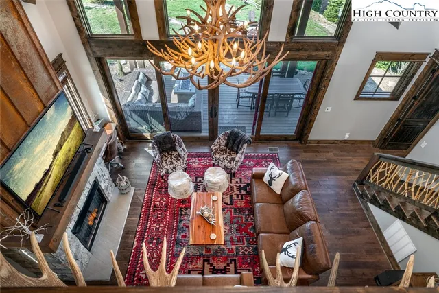 a room with furniture and pool table