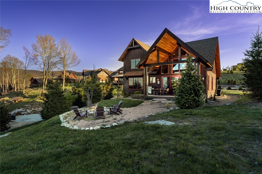 344 High Country Overlook Banner Elk, NC 28604 - Photo 32 of 48 a front view of a house with a yard