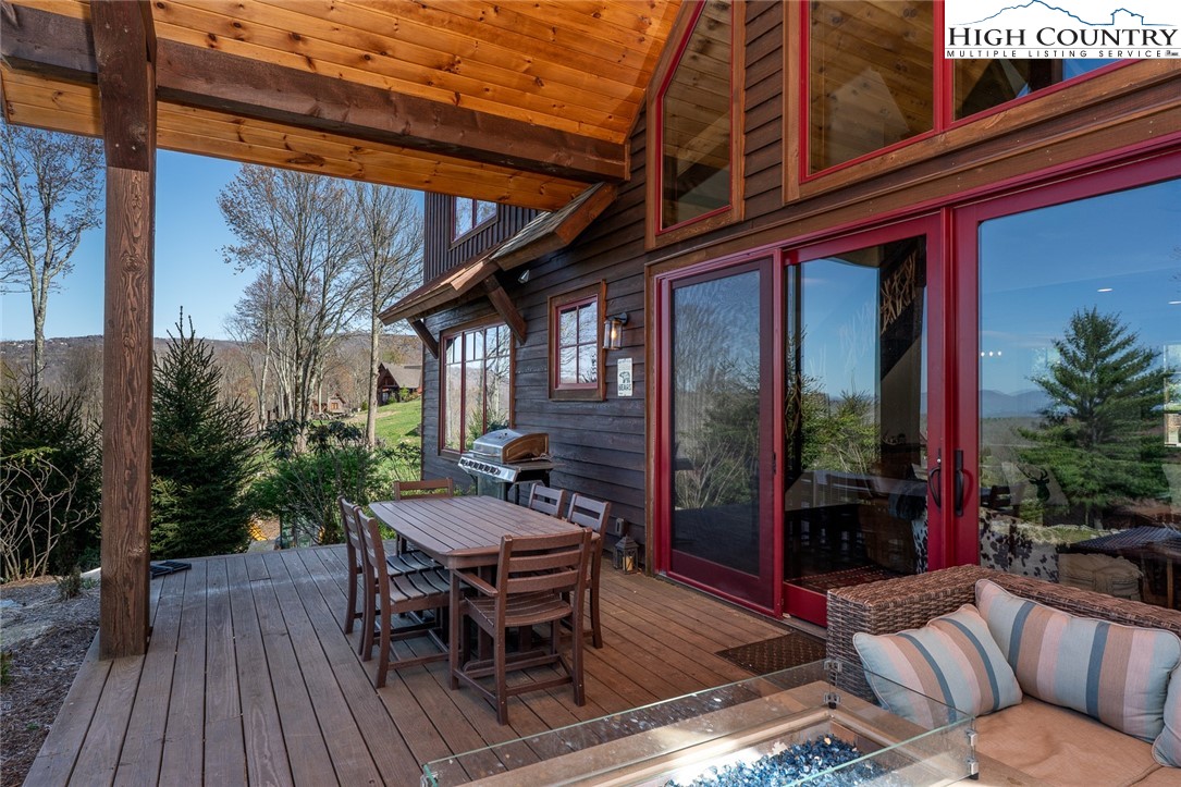 344 High Country Overlook Banner Elk, NC 28604 - Photo 33 of 48 a view of a backyard with a patio and outdoor seating