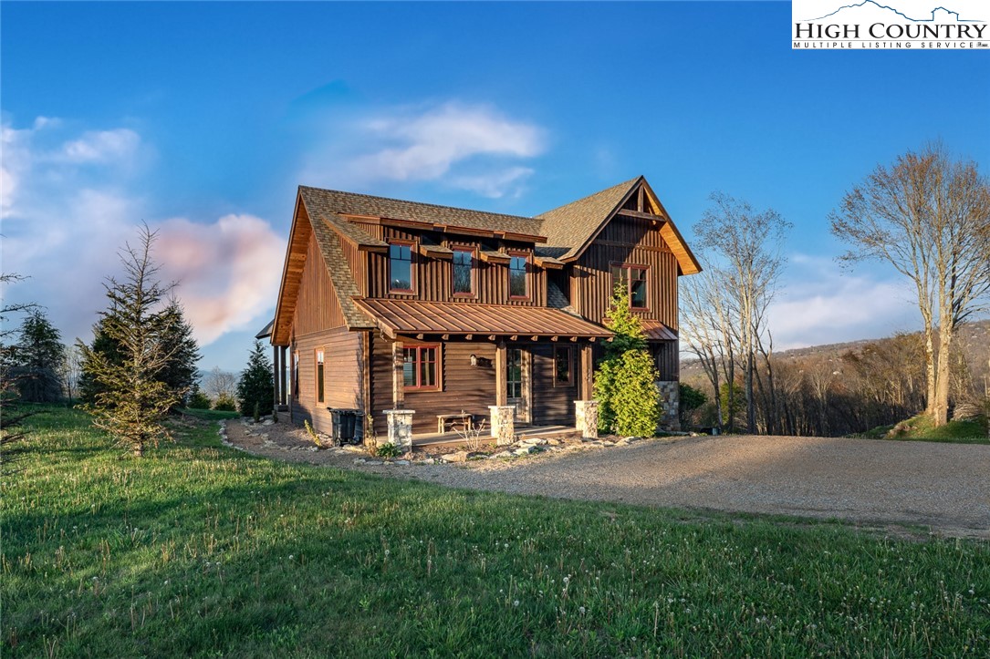 344 High Country Overlook Banner Elk, NC 28604 - Photo 41 of 48 a front view of a house with a yard