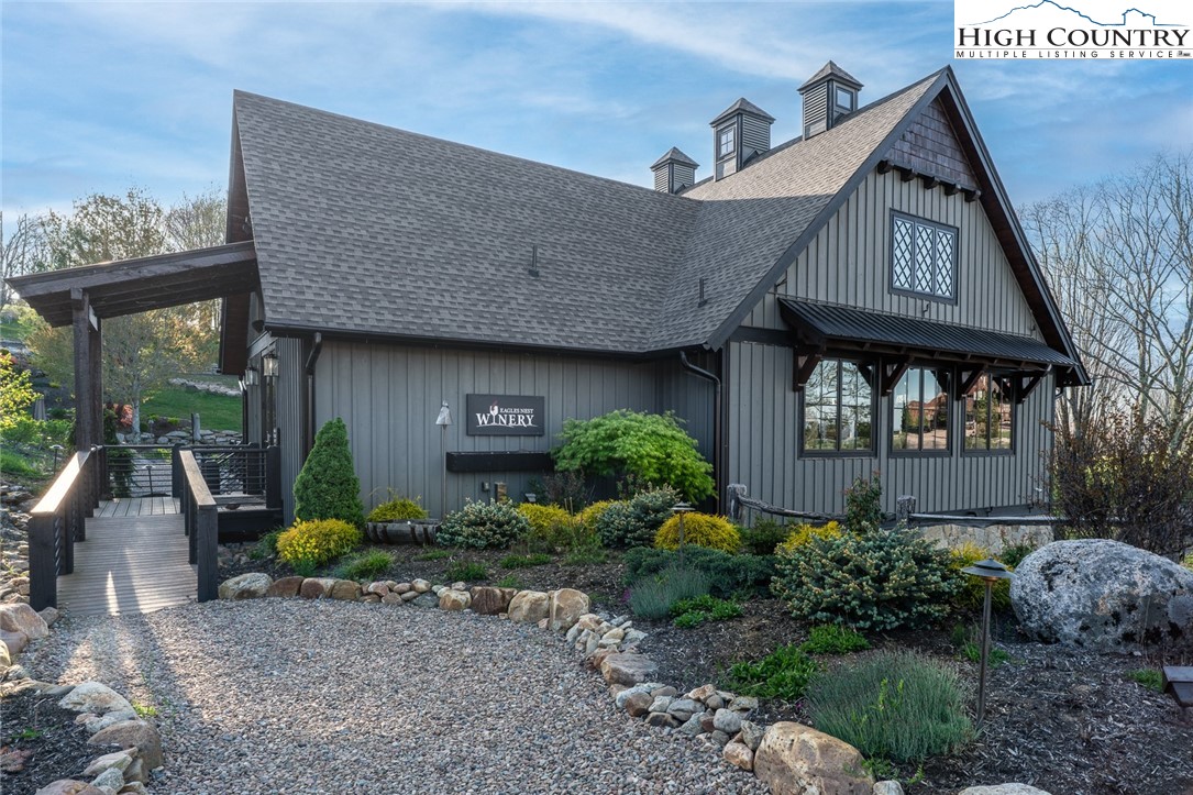 344 High Country Overlook Banner Elk, NC 28604 - Photo 43 of 48 a front view of a house with garden