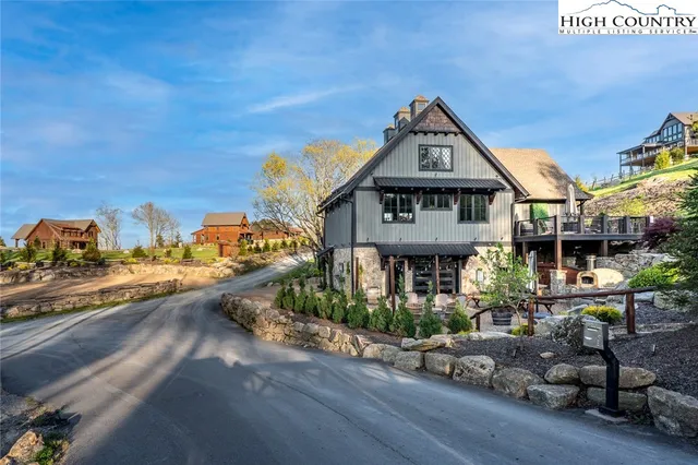a lake view with sitting space and garden view