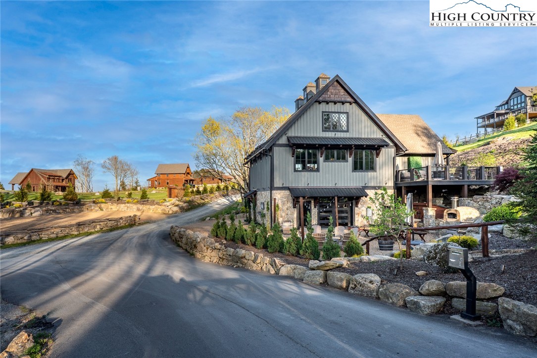 344 High Country Overlook Banner Elk, NC 28604 - Photo 46 of 48 a front view of a house with garden