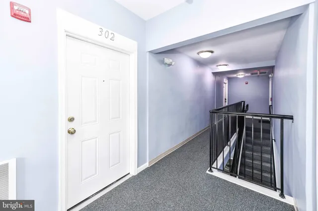 a view of a hallway with elevator