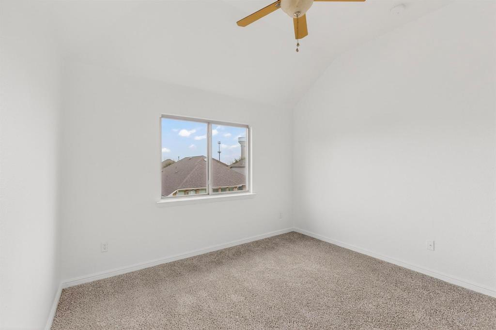 174 Hampton Drive Fate, TX 75087 - Photo 24 of 40 an empty room with a window