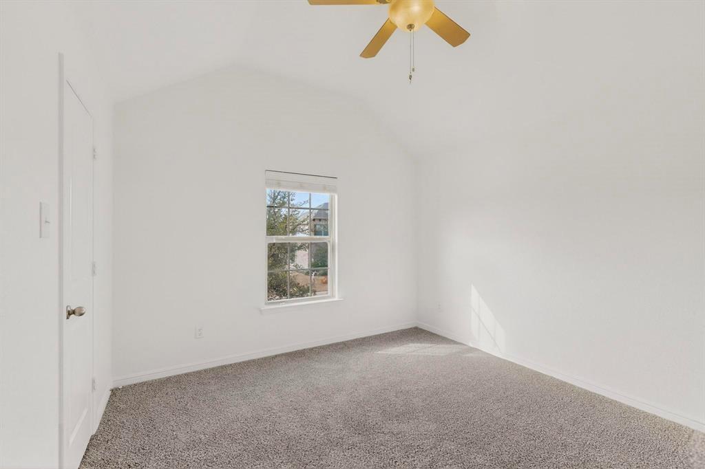174 Hampton Drive Fate, TX 75087 - Photo 29 of 40 an empty room with a window