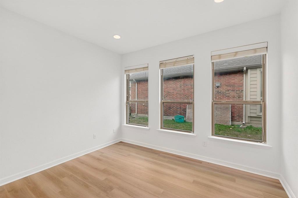 174 Hampton Drive Fate, TX 75087 - Photo 33 of 40 an empty room with a window