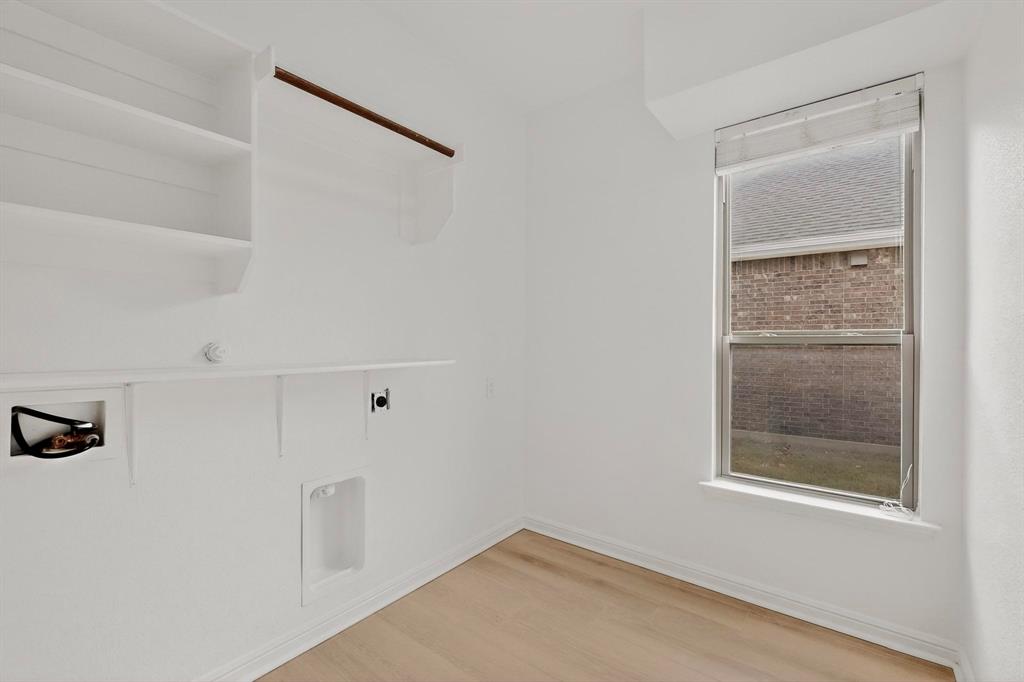 174 Hampton Drive Fate, TX 75087 - Photo 35 of 40 a view of an empty room with closet