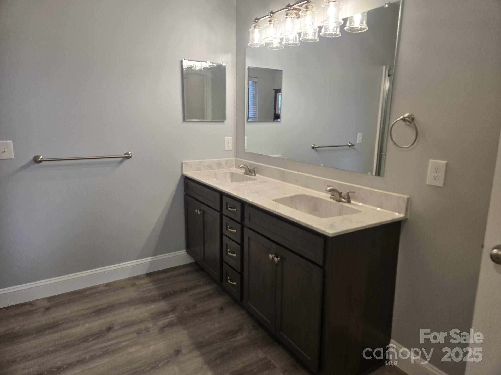 119 Tryon View Drive Flat Rock, NC 28731 - Photo 12 of 22 a bathroom with a sink vanity and mirror