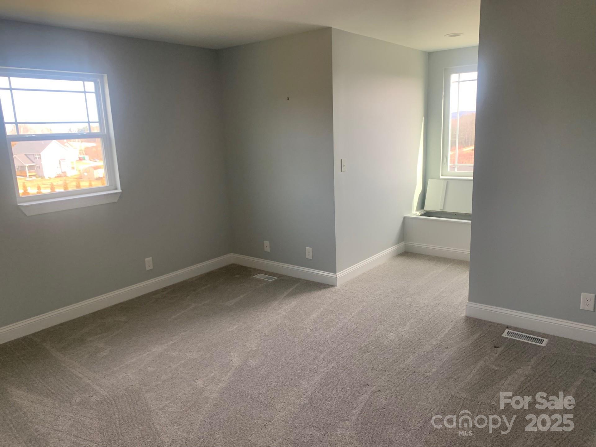 119 Tryon View Drive Flat Rock, NC 28731 - Photo 15 of 22 an empty room with a window
