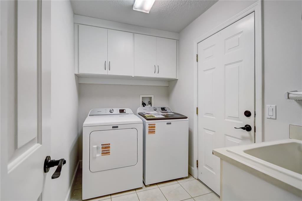 16 Edgar Lane Palm Coast, FL 32164 - Photo 18 of 53 a utility room with dryer and washer