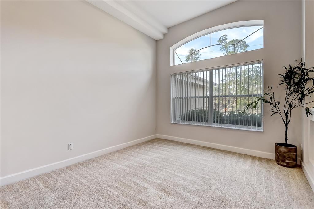 16 Edgar Lane Palm Coast, FL 32164 - Photo 24 of 53 a view of an empty room with a window