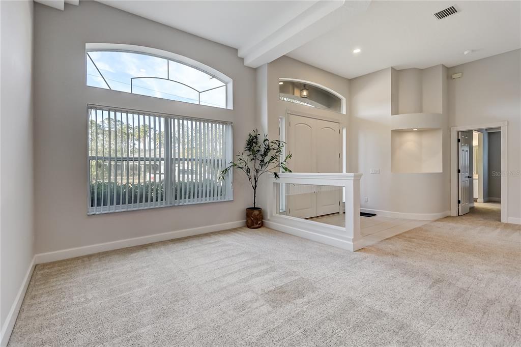 16 Edgar Lane Palm Coast, FL 32164 - Photo 26 of 53 a view of an empty room with a window