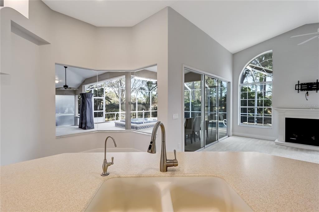 16 Edgar Lane Palm Coast, FL 32164 - Photo 30 of 53 a spacious bathroom with a tub sink and large window