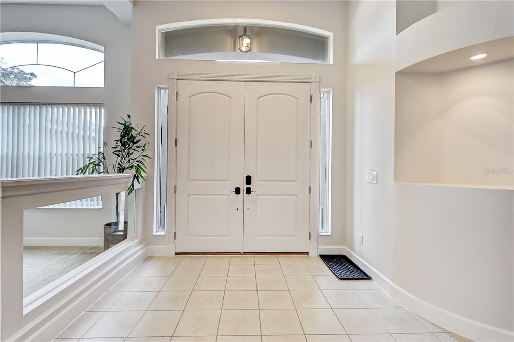 16 Edgar Lane Palm Coast, FL 32164 - Photo 9 of 53 a view of front door with a door