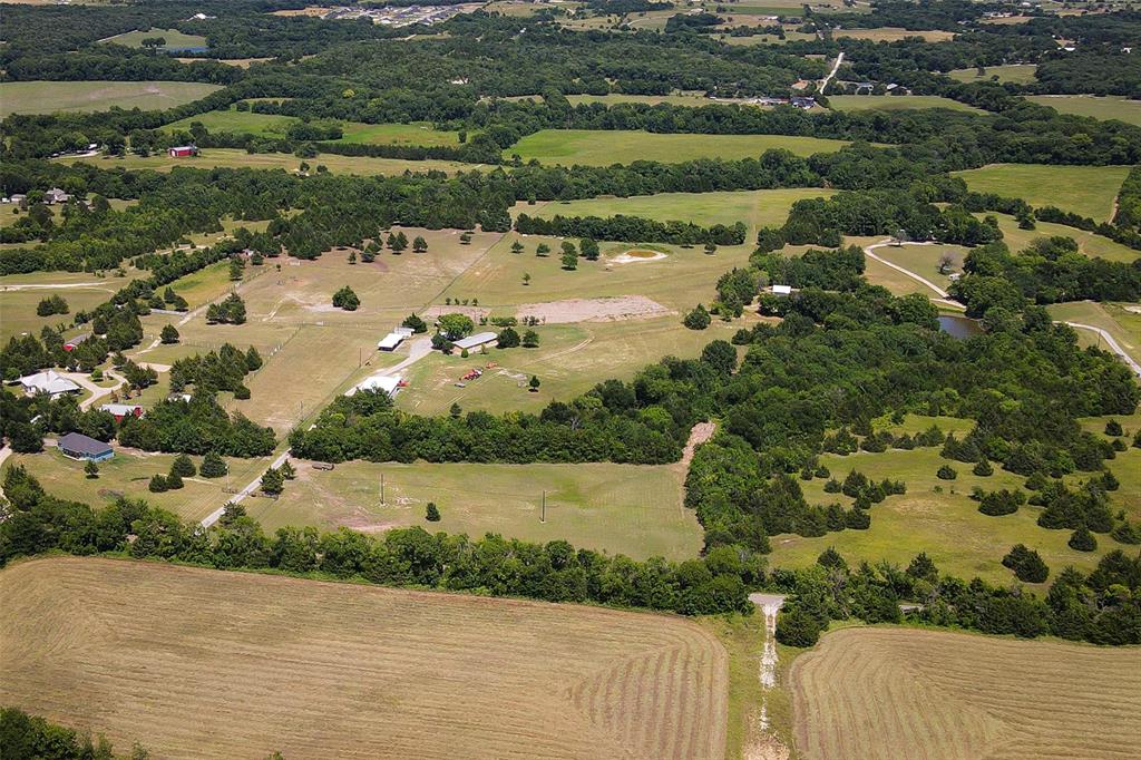 Lot 2 Edwards Road Van Alstyne, TX 75495 - Photo 5 of 5 an aerial view of ocean with residential houses with outdoor space and trees