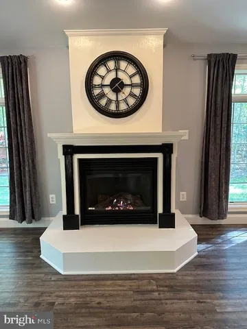 a kitchen with stainless steel appliances granite countertop a sink and a granite counter tops