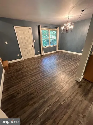 a view of a room with a window