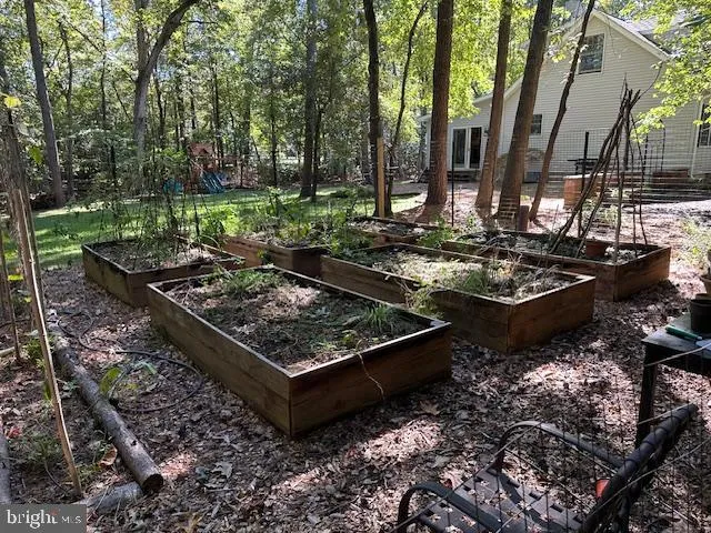 a view of a backyard of the house