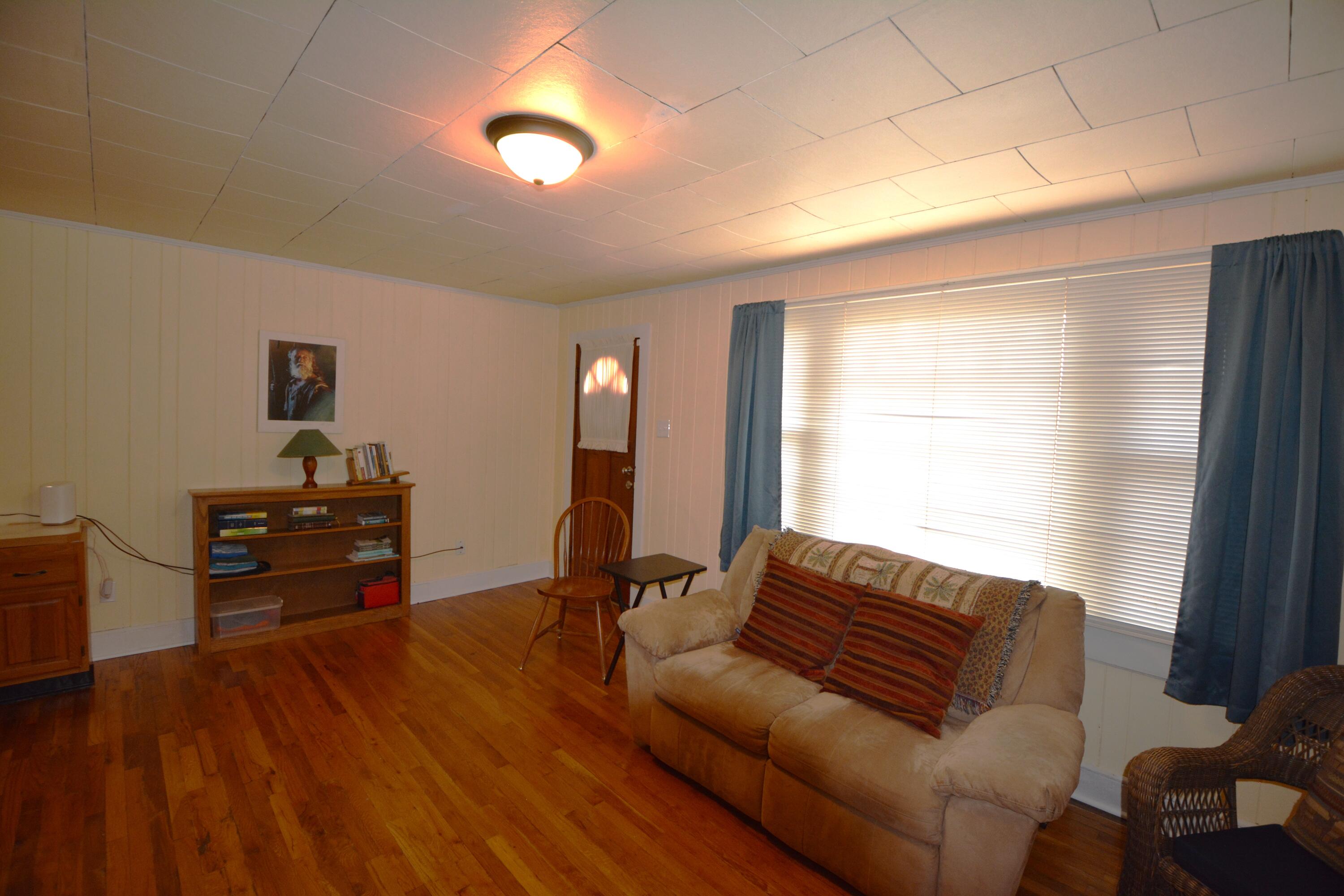 3316 Bassett Heights Road Bassett, VA 24055 - Photo 16 of 51 a living room with furniture and a flat screen tv