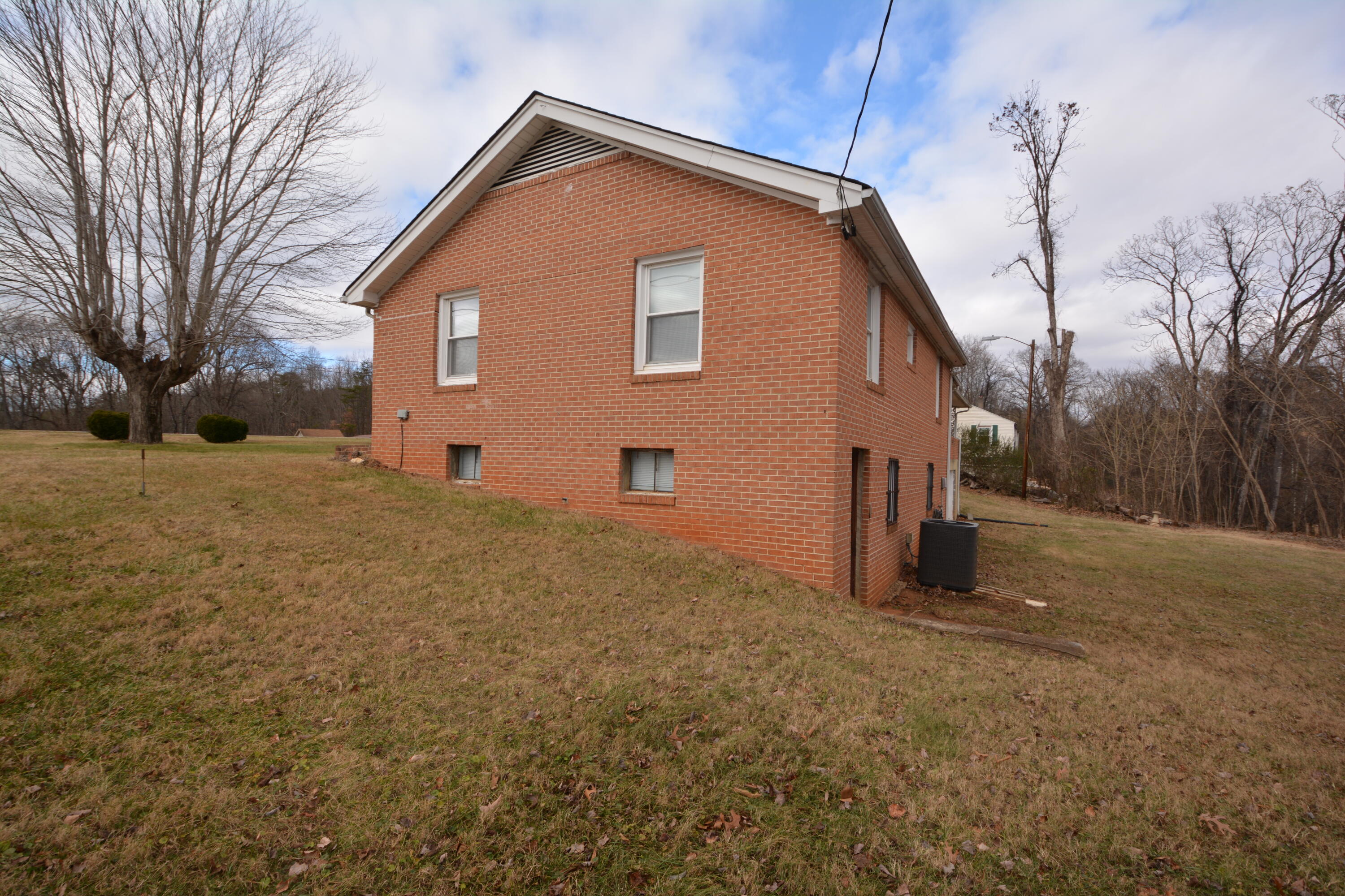3316 Bassett Heights Road Bassett, VA 24055 - Photo 46 of 51 a view of a house with a yard
