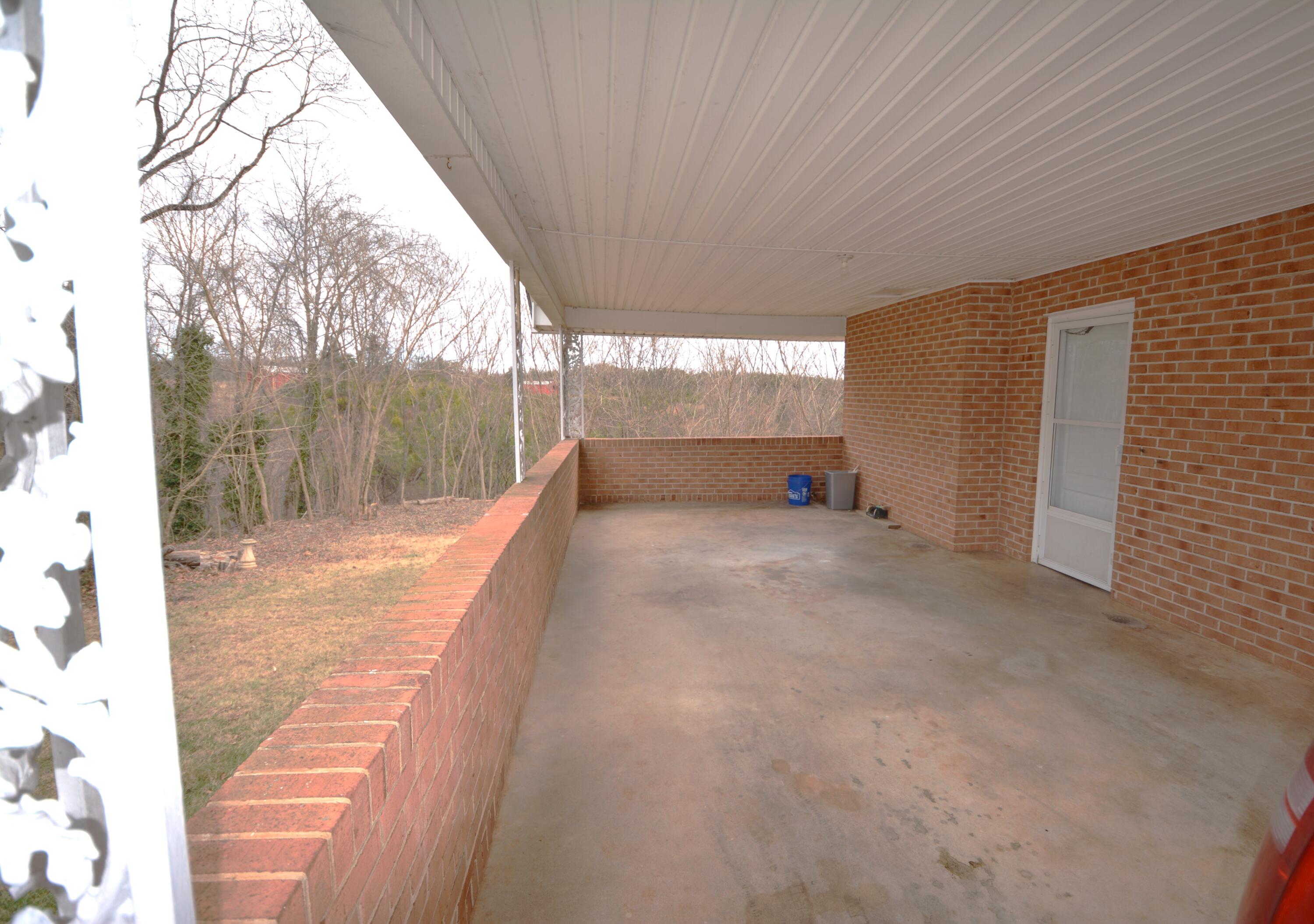 3316 Bassett Heights Road Bassett, VA 24055 - Photo 48 of 51 a view of a back yard from a balcony