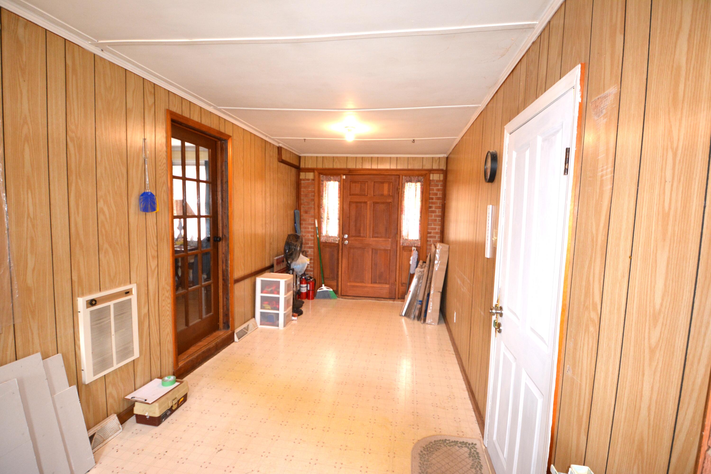 3316 Bassett Heights Road Bassett, VA 24055 - Photo 51 of 51 a view of a hallway with furniture and a window