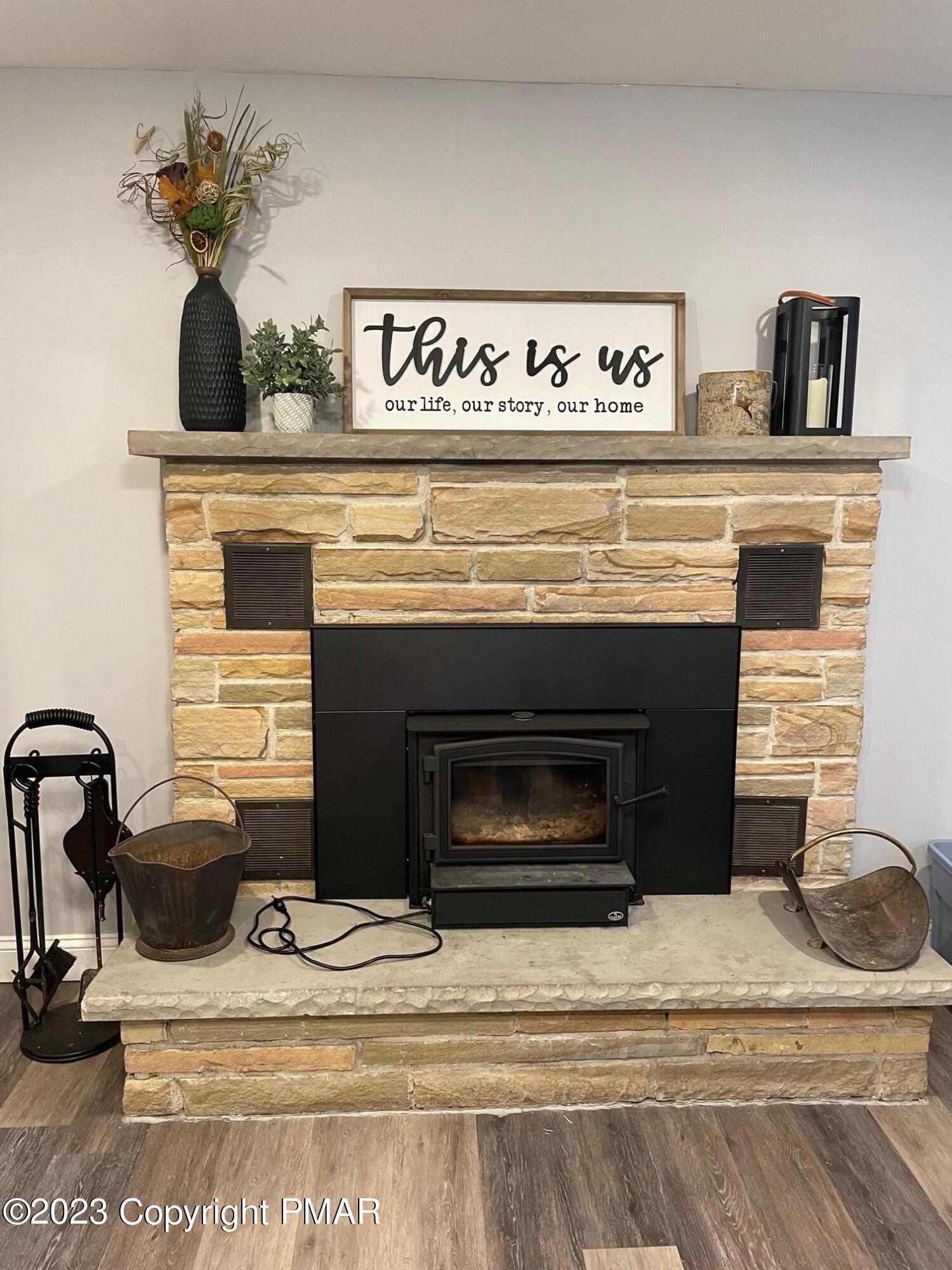 83 Fox Hill Road Albrightsville, PA 18210 - Photo 4 of 22 a view of fireplace and kitchen