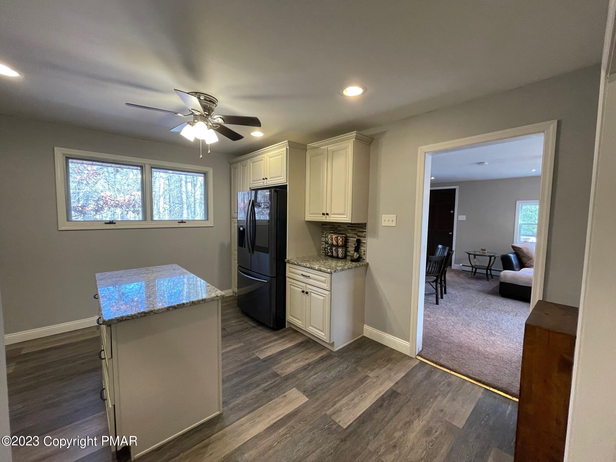 83 Fox Hill Road Albrightsville, PA 18210 - Photo 10 of 22 a kitchen with refrigerator and cabinets