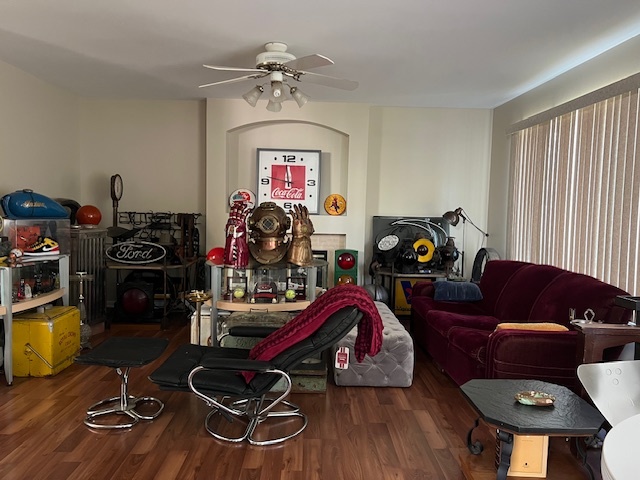 1229 Pennsbury Lane Aurora, IL 60502 - Photo 11 of 25 a view of a livingroom with furniture and a gym cycle