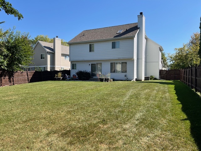 1229 Pennsbury Lane Aurora, IL 60502 - Photo 2 of 25 a view of house with yard