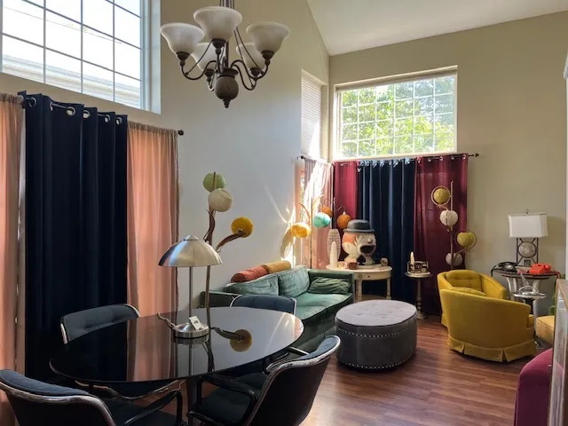 a living room with furniture and a window