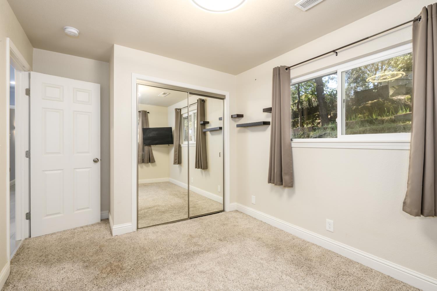 2873 Anderson Way Placerville, CA 95667 - Photo 18 of 24 wooden floor and window in a room
