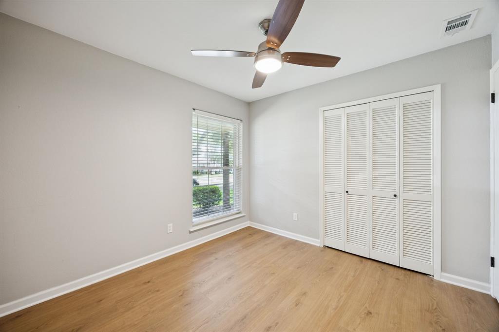 2015 Sandy Trail Richardson, TX 75080 - Photo 15 of 19 wooden floor in an empty room with a window