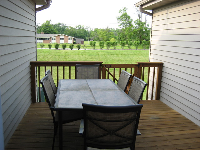 1444 Mackenzie Lane Elgin, IL 60120 - Photo 11 of 25 a view of a chairs on the roof deck