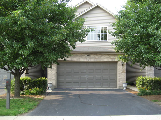 1444 Mackenzie Lane Elgin, IL 60120 - Photo 2 of 25 front view of a house