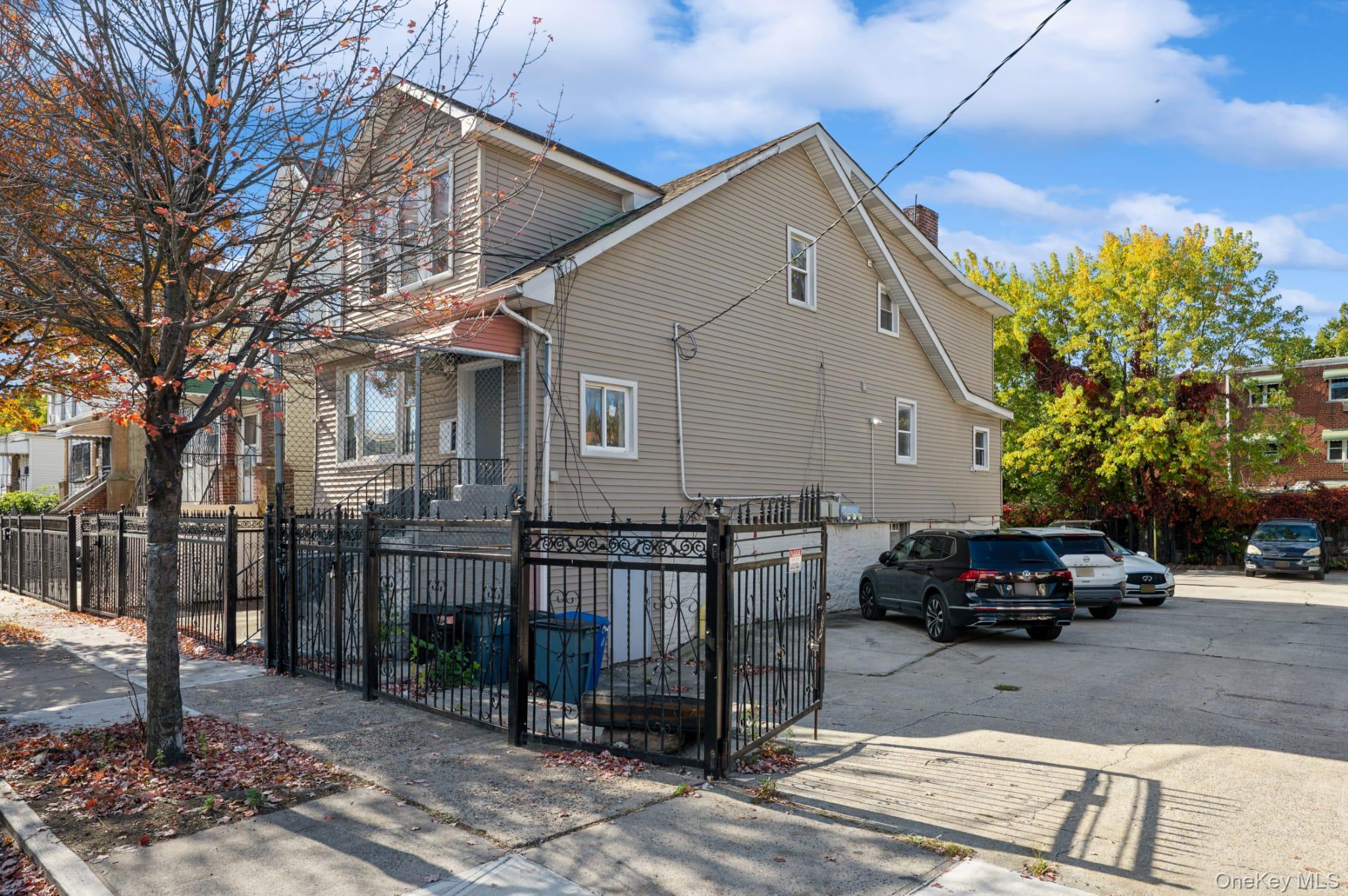 611 St Lawrence Avenue, Unit 1 Bronx, NY 10473 - Photo 10 of 20 a car parked in front of a house