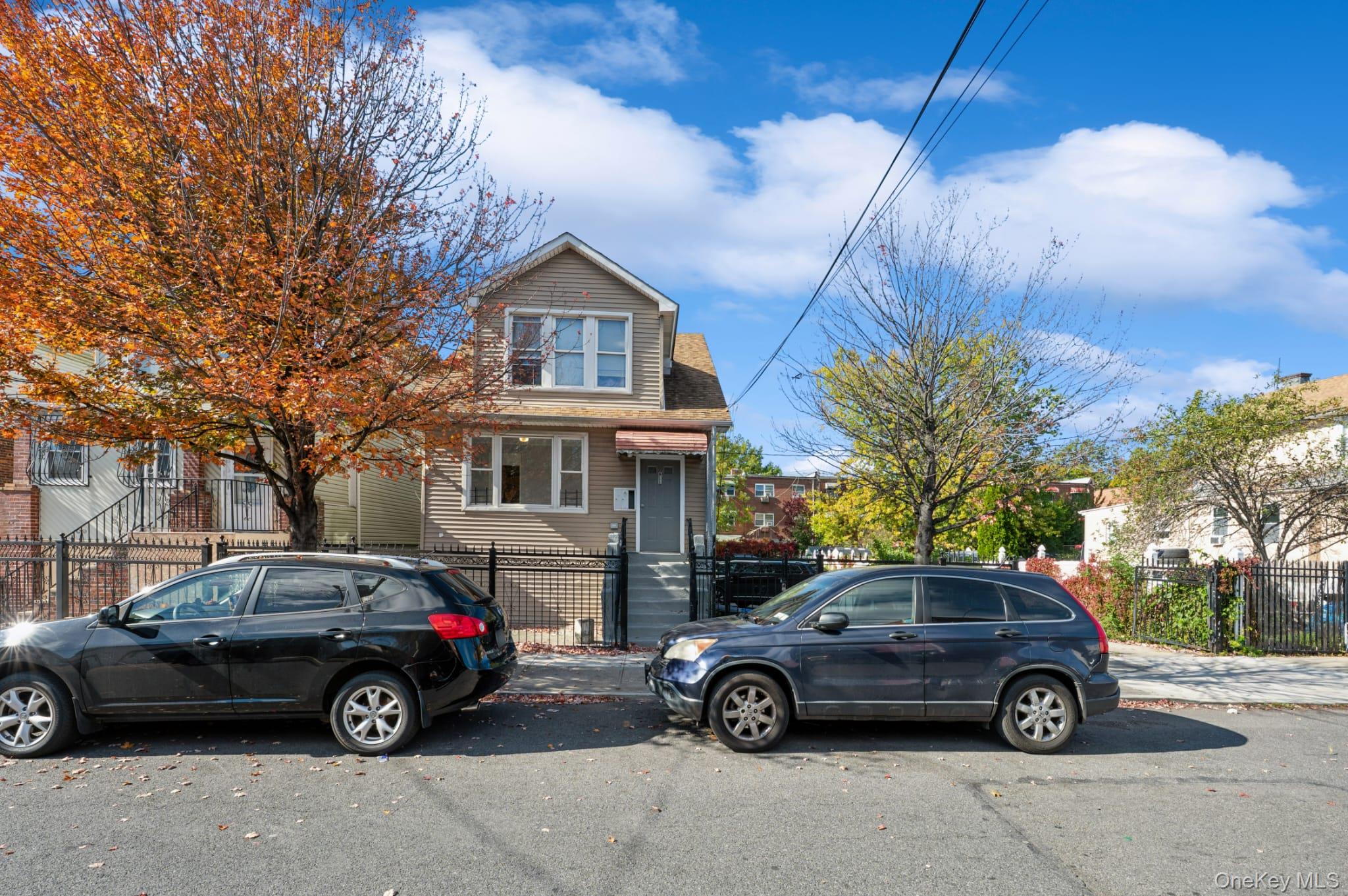 611 St Lawrence Avenue, Unit 1 Bronx, NY 10473 - Photo 13 of 20 a car parked in front of a house