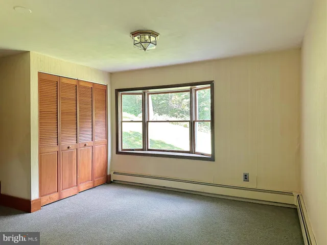 a view of a livingroom with furniture and a couch