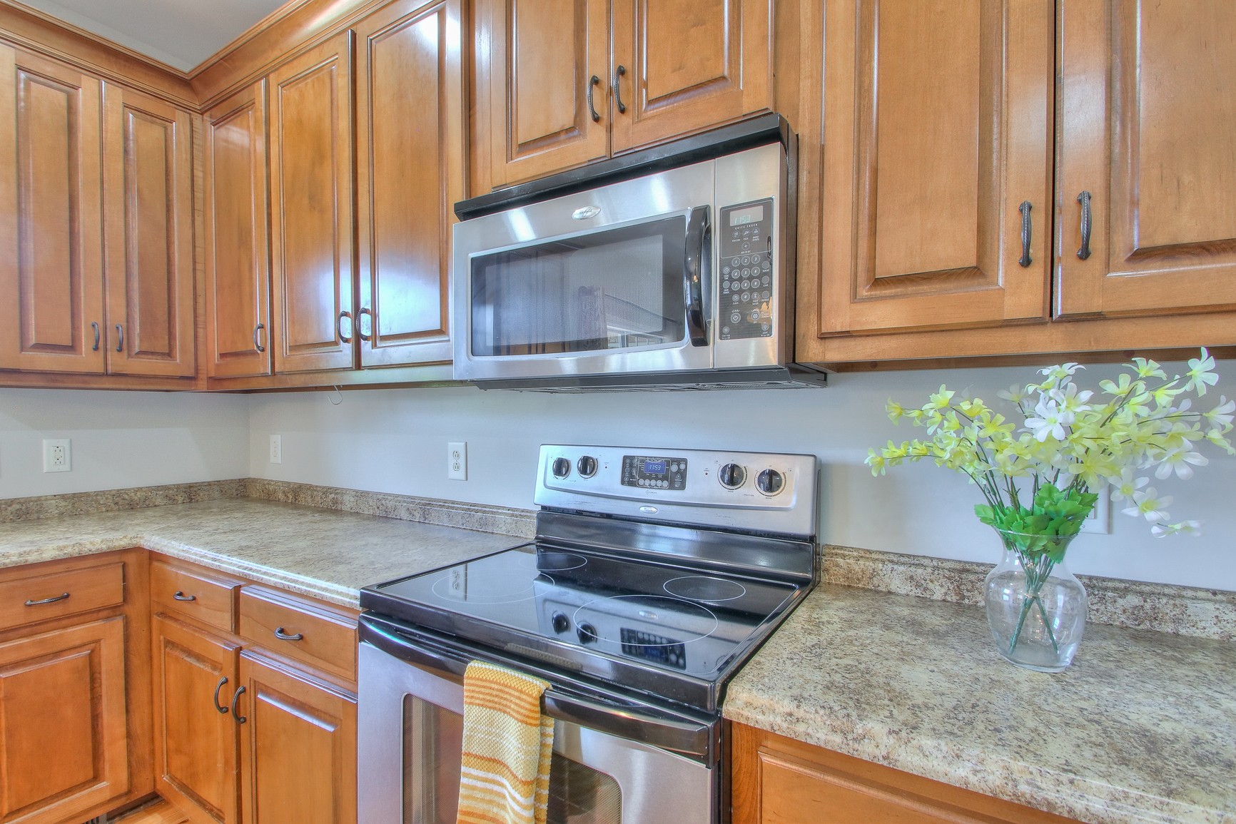 773 Sugar Flat Road Lebanon, TN 37087 - Photo 18 of 41 a kitchen with stainless steel appliances granite countertop a coffee maker on granite counter tops