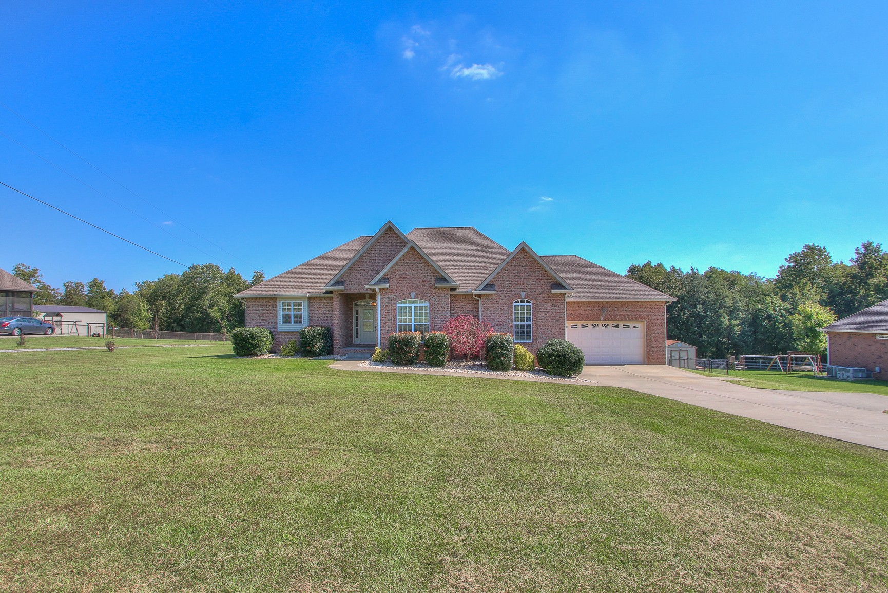 773 Sugar Flat Road Lebanon, TN 37087 - Photo 3 of 41 a front view of a house with a yard