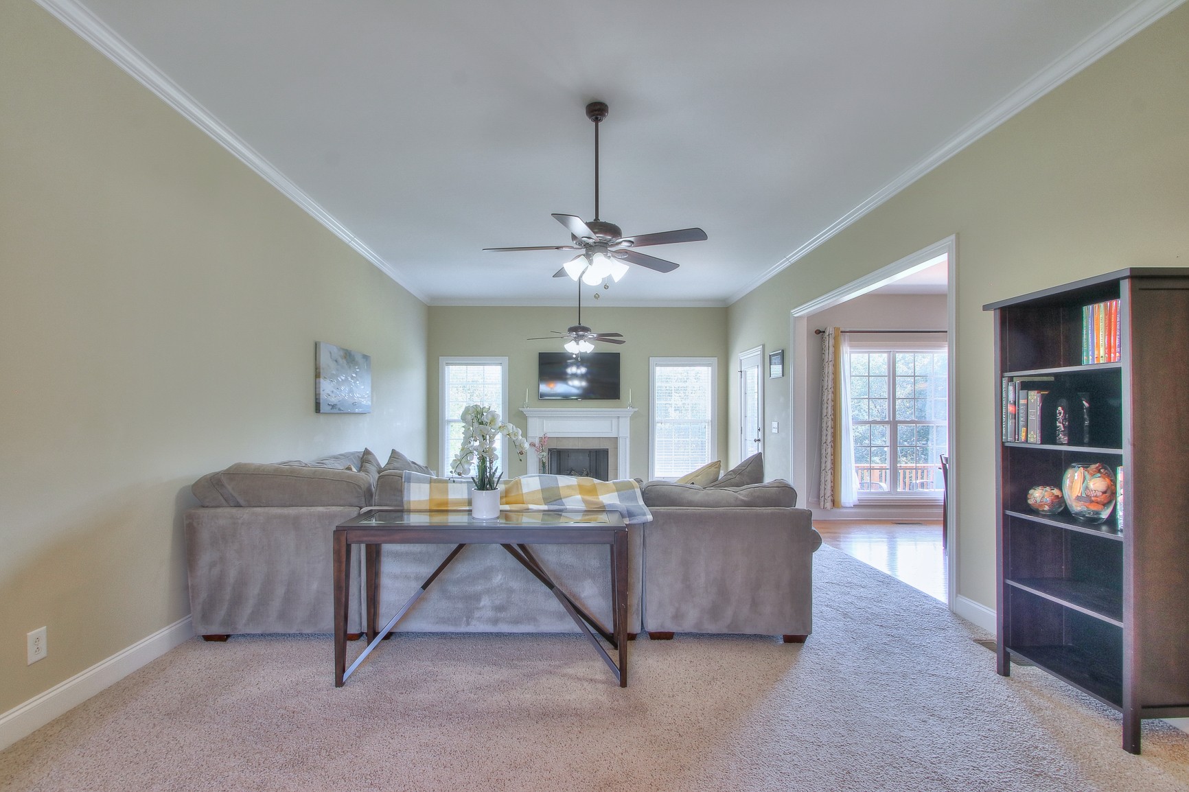773 Sugar Flat Road Lebanon, TN 37087 - Photo 22 of 41 a living room with furniture and a chandelier