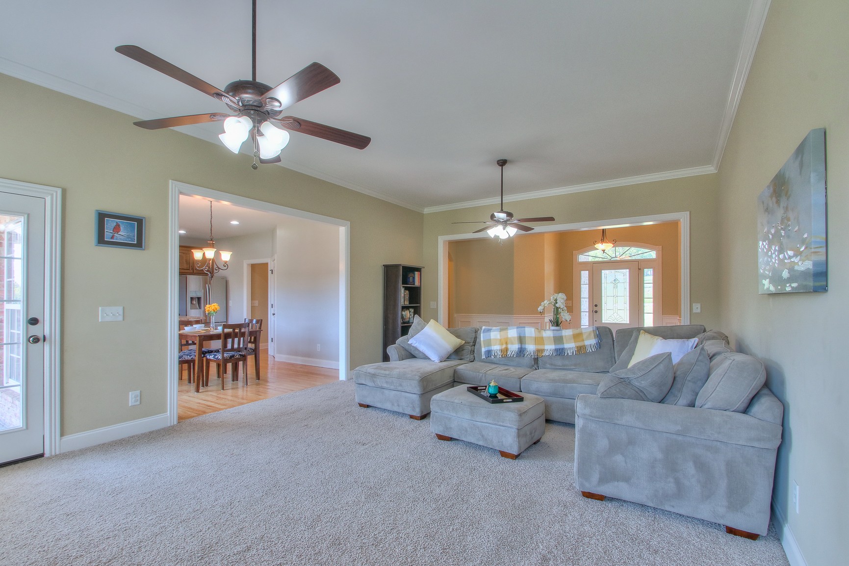 773 Sugar Flat Road Lebanon, TN 37087 - Photo 24 of 41 a living room with furniture and a chandelier