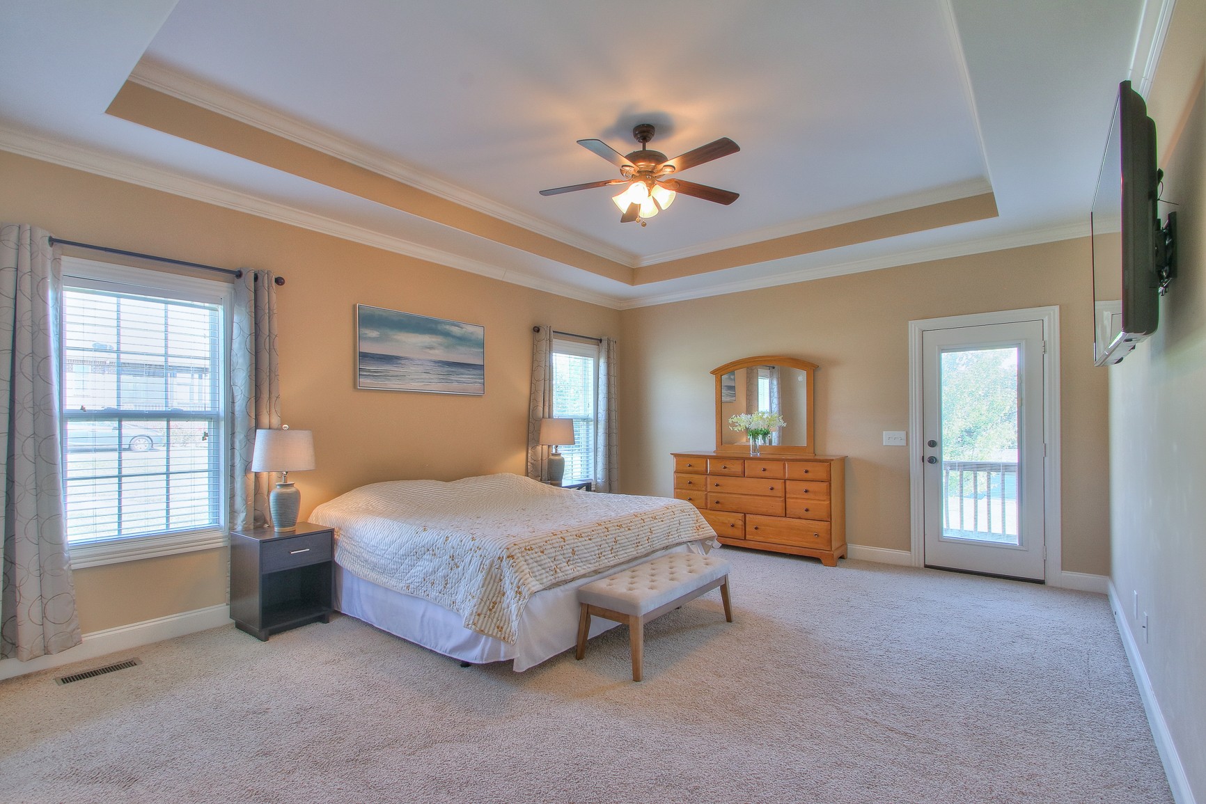 773 Sugar Flat Road Lebanon, TN 37087 - Photo 26 of 41 a bedroom with a bed and a chandelier