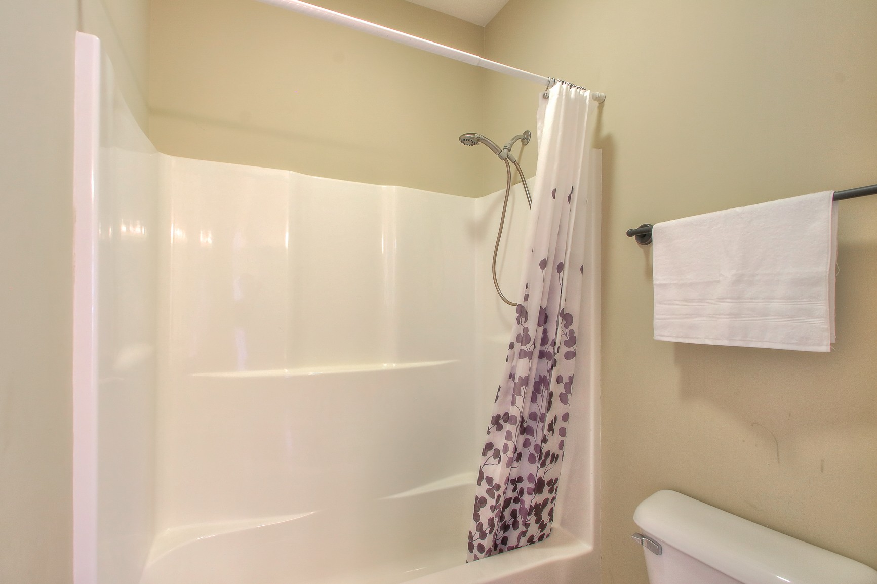 773 Sugar Flat Road Lebanon, TN 37087 - Photo 35 of 41 a bathroom with a shower curtain and a bathtub
