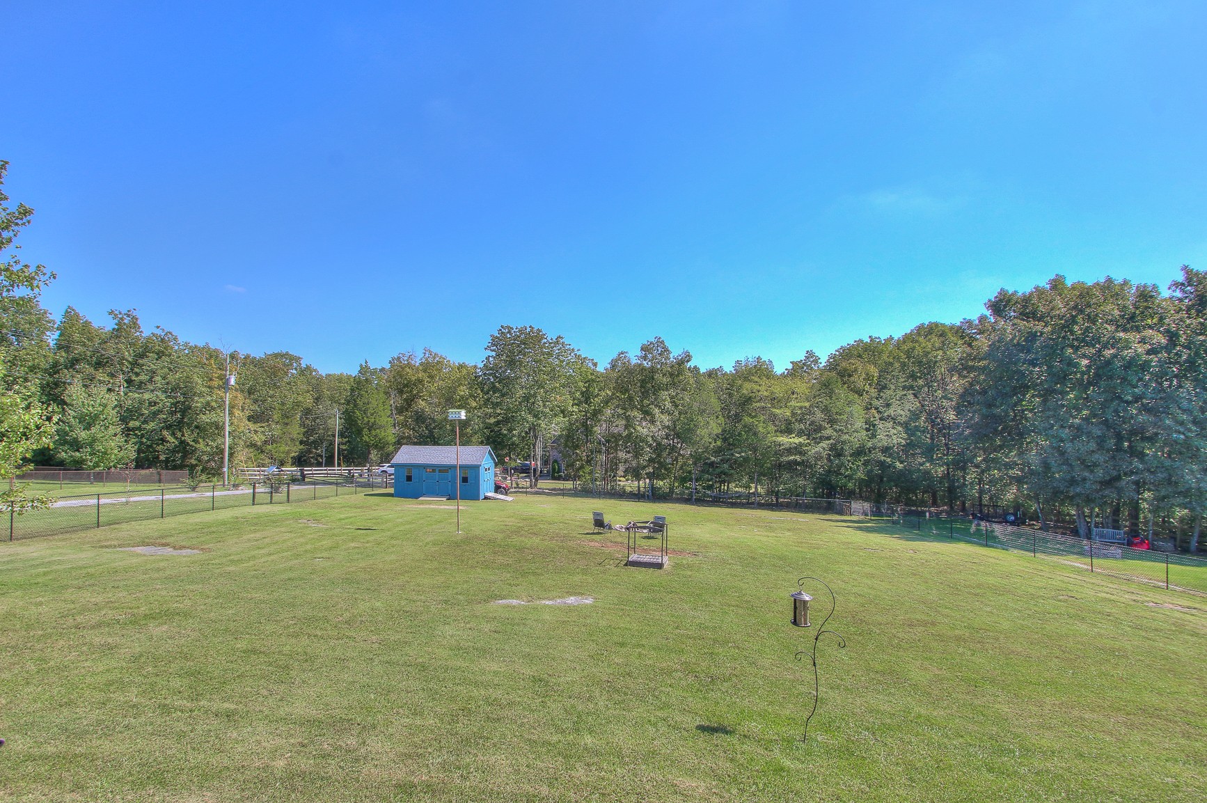 773 Sugar Flat Road Lebanon, TN 37087 - Photo 39 of 41 a view of a green field with trees in the background