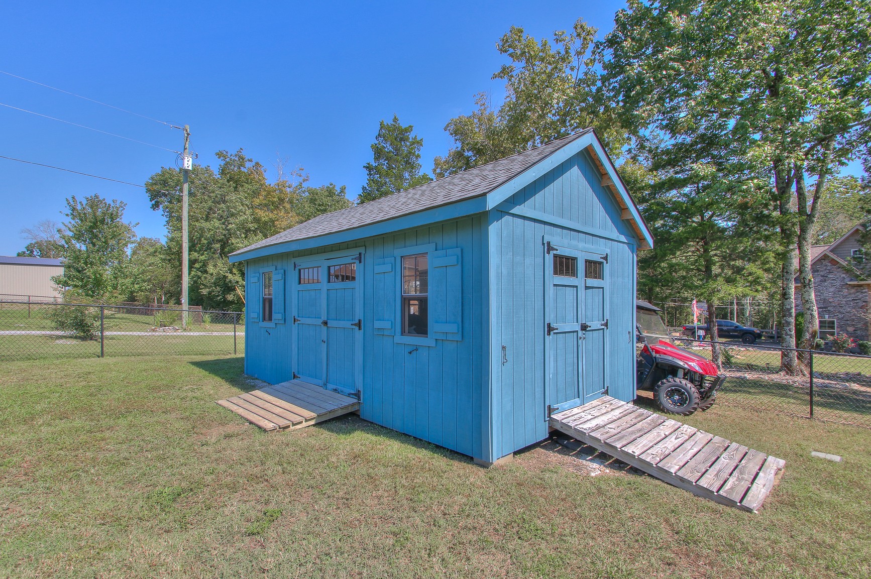 773 Sugar Flat Road Lebanon, TN 37087 - Photo 40 of 41 a view of a house with a backyard and a tree