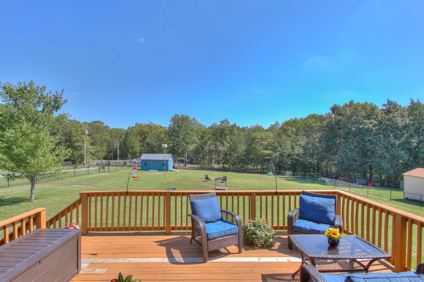773 Sugar Flat Road Lebanon, TN 37087 - Photo 8 of 41 a view of a wooden deck with furniture