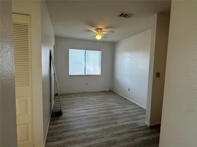 a view of a livingroom with wooden floor