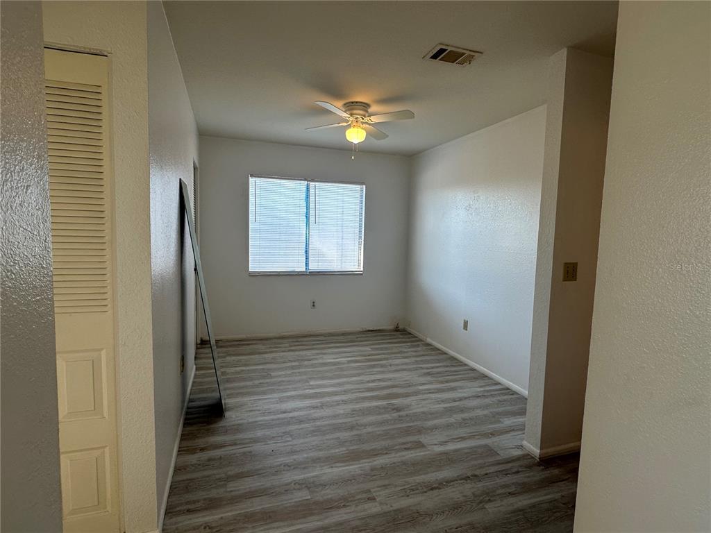 8100 Pickwick Road North Port, FL 34287 - Photo 3 of 15 a view of a livingroom with wooden floor